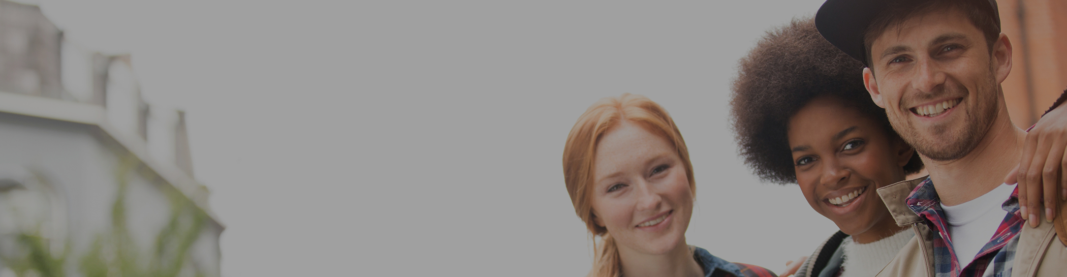 Multiple people smiling outside