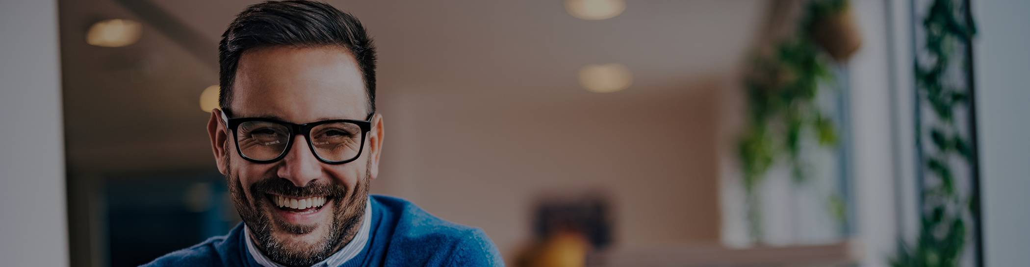 Close up of smiling man with glasses