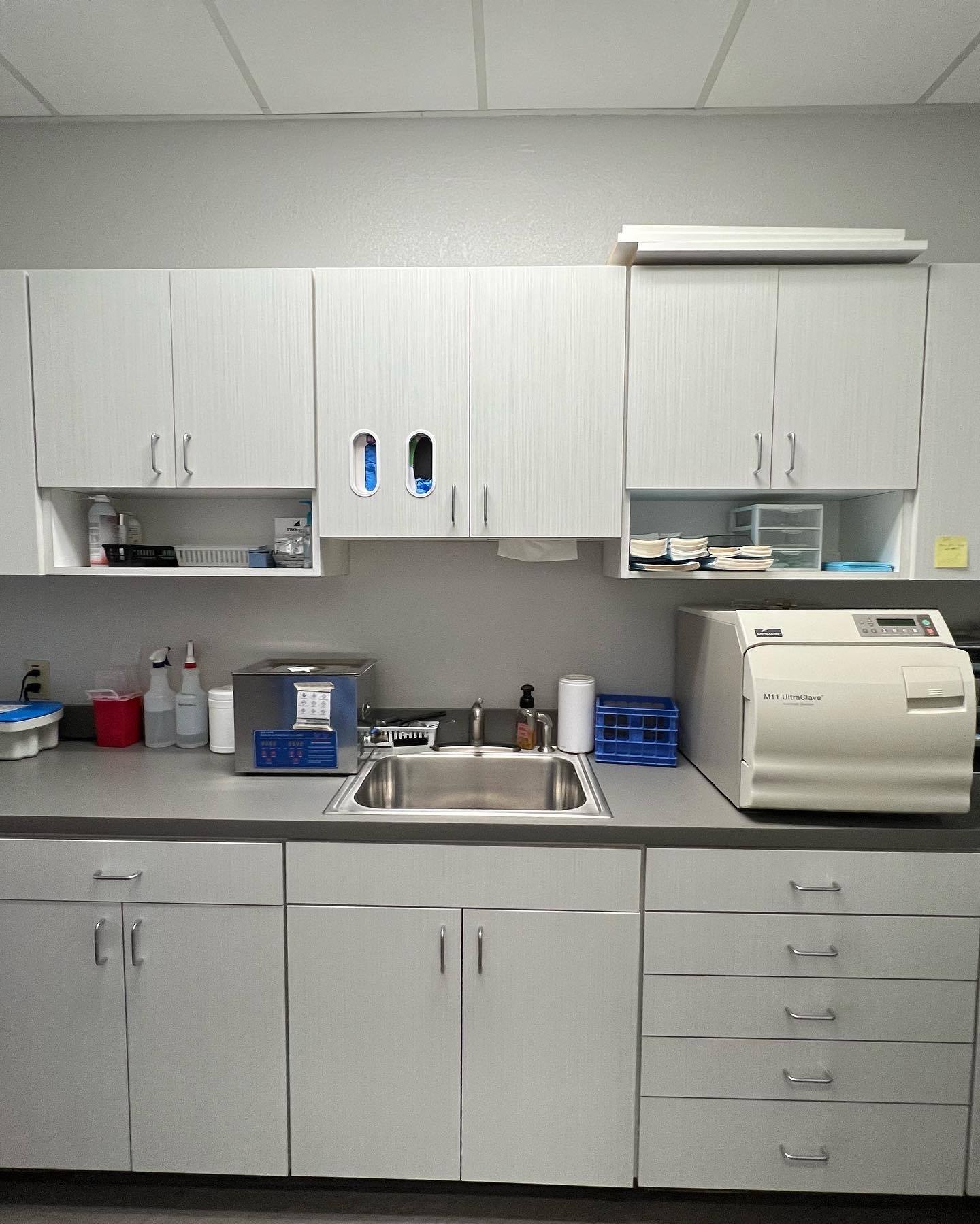 Sink and filing cabinets in dental office