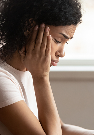 Close up of woman with jaw pain