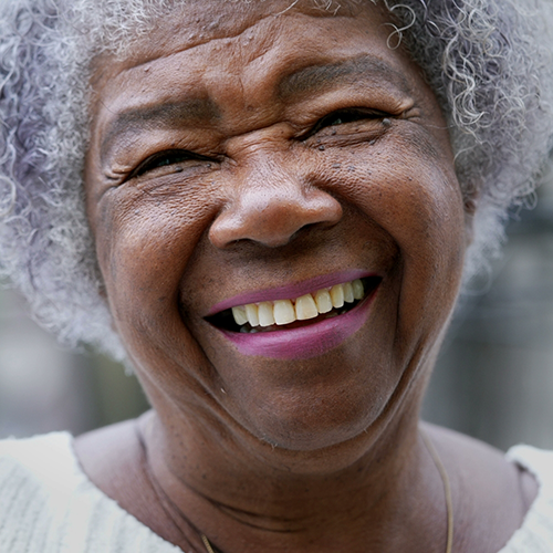 Close up of grey haired woman smiling