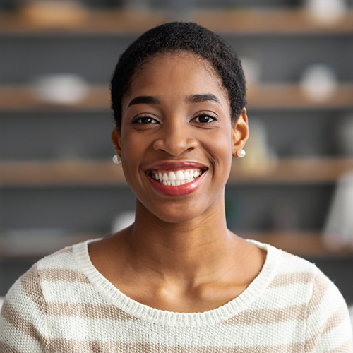 Woman with striped sweater smiling
