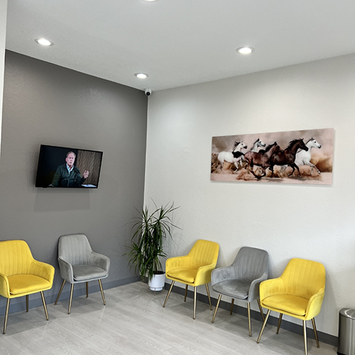 Chairs against walls in dental waiting room
